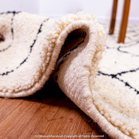 Timeless Moroccan Wool Rug with Black Diamond Lattice Design Timeless Moroccan Wool Rug with Black Diamond Lattice Design