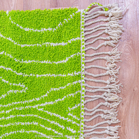 Bright Green Moroccan Rug with Tree Trunk-Inspired White Patterns Bright Green Moroccan Rug with Tree Trunk-Inspired White Patterns