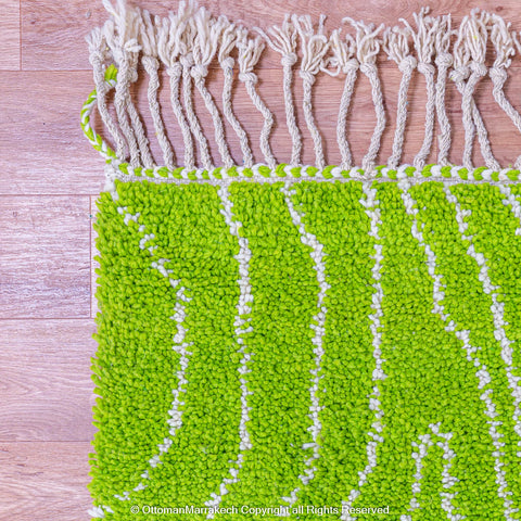 Bright Green Moroccan Rug with Tree Trunk-Inspired White Patterns Bright Green Moroccan Rug with Tree Trunk-Inspired White Patterns
