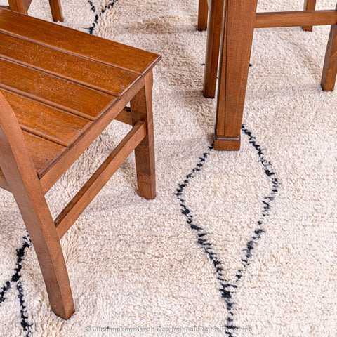 Minimalist Beni Ourain Moroccan Rug with Black Diamond Patterns on Ivory Wool Minimalist Beni Ourain Moroccan Rug with Black Diamond Patterns on Ivory Wool