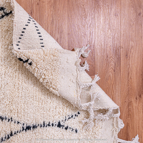 Minimalist Beni Ourain Moroccan Rug with Black Diamond Patterns on Ivory Wool Minimalist Beni Ourain Moroccan Rug with Black Diamond Patterns on Ivory Wool