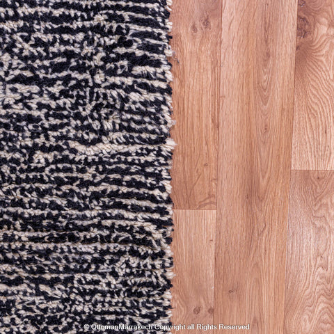 Abstract Moroccan Wool Rug in Black, Cream, and Red Tones Abstract Moroccan Wool Rug in Black, Cream, and Red Tones