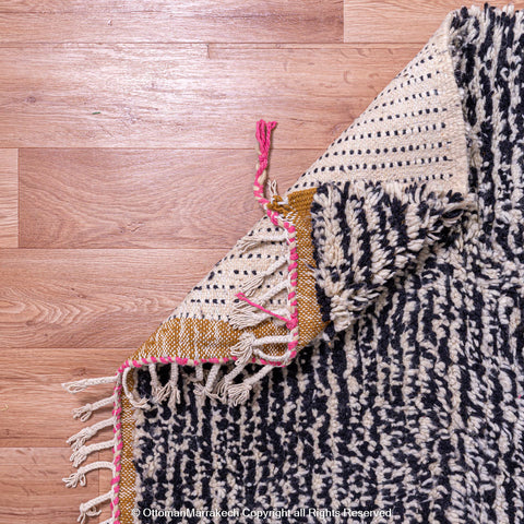 Abstract Moroccan Wool Rug in Black, Cream, and Red Tones Abstract Moroccan Wool Rug in Black, Cream, and Red Tones