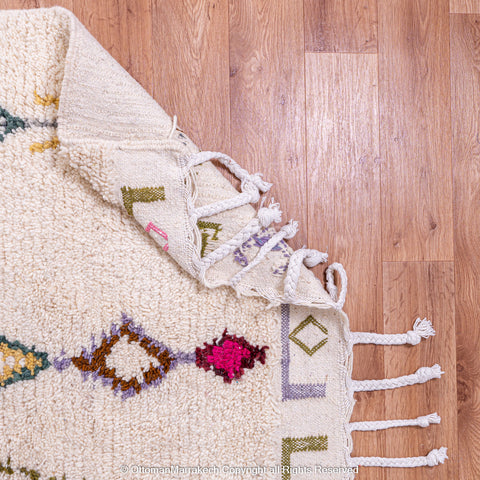 Beige Beni Ourain Rug with Colorful Berber Symbols Beige Beni Ourain Rug with Colorful Berber Symbols