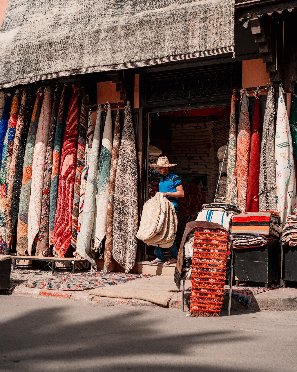 Explore the Essence of Moroccan Craftsmanship: Handmade Rugs, Moroccan Poufs, Leather Goods, and Straw Bags