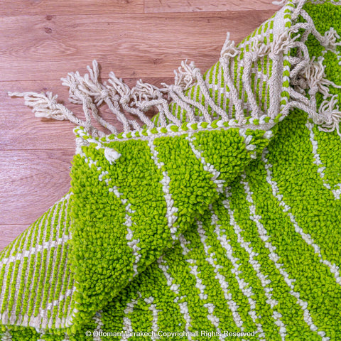 Bright Green Moroccan Rug with Tree Trunk-Inspired White Patterns