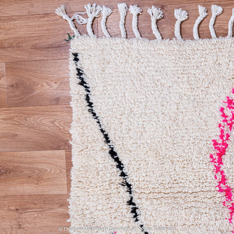 Handwoven Moroccan Berber Rug with Colorful Accents