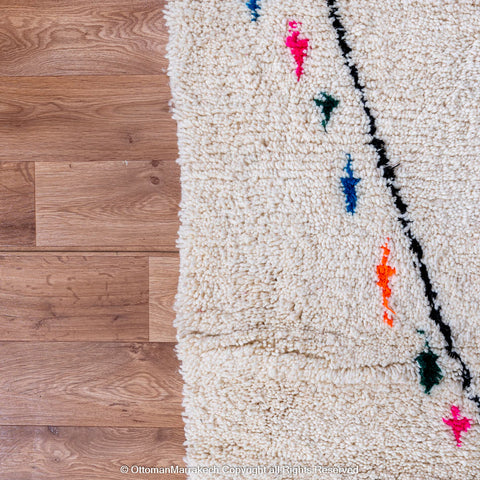 Handwoven Moroccan Berber Rug with Colorful Accents