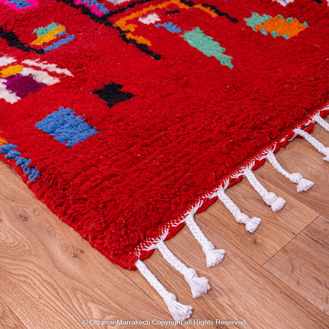 Bold Red Berber Rug with Multicolored Patterns