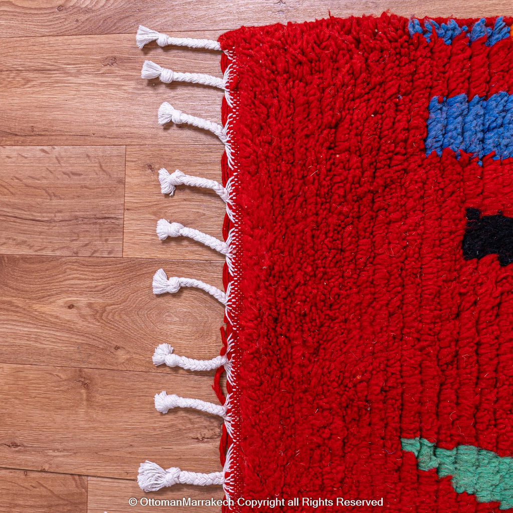 Bold Red Berber Rug with Multicolored Patterns