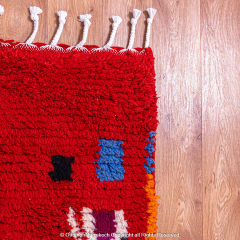 Bold Red Berber Rug with Multicolored Patterns