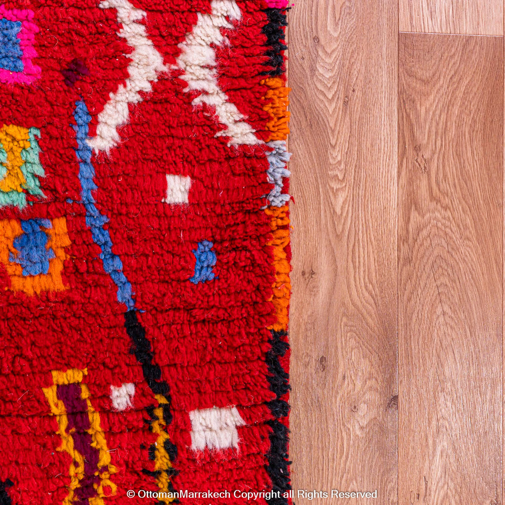 Bold Red Berber Rug with Multicolored Patterns