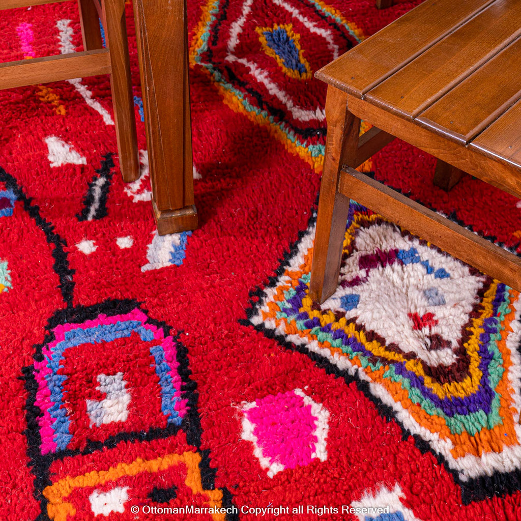 Bold Red Berber Rug with Multicolored Patterns