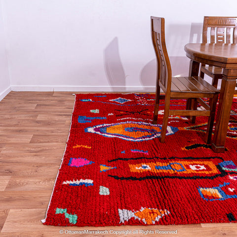 Bold Red Berber Rug with Multicolored Patterns