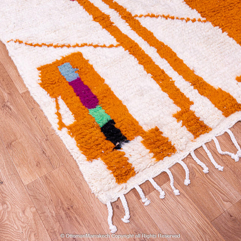 Moroccan White Berber Rug with Red and Orange Geometric Accents