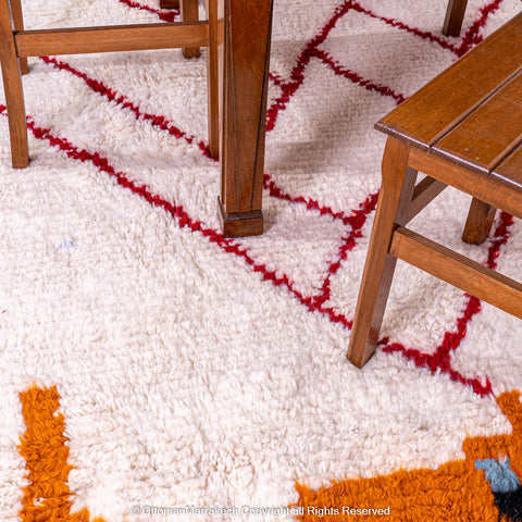 Moroccan White Berber Rug with Red and Orange Geometric Accents