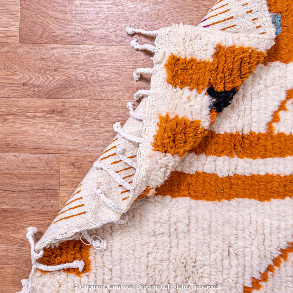 Moroccan White Berber Rug with Red and Orange Geometric Accents