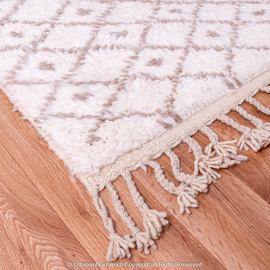 Soft White Berber Rug with Subtle Geometric Patterns