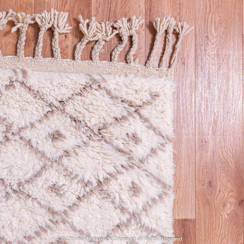 Soft White Berber Rug with Subtle Geometric Patterns