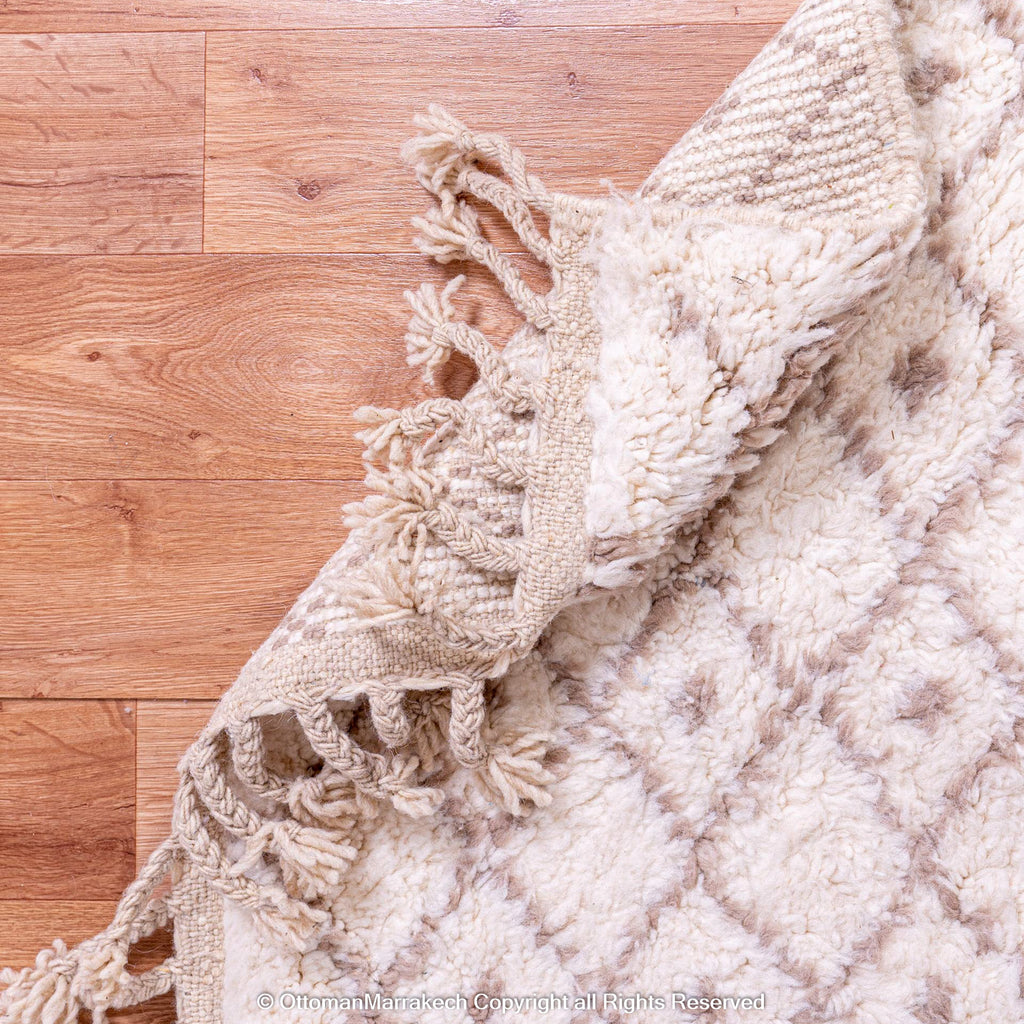 Soft White Berber Rug with Subtle Geometric Patterns