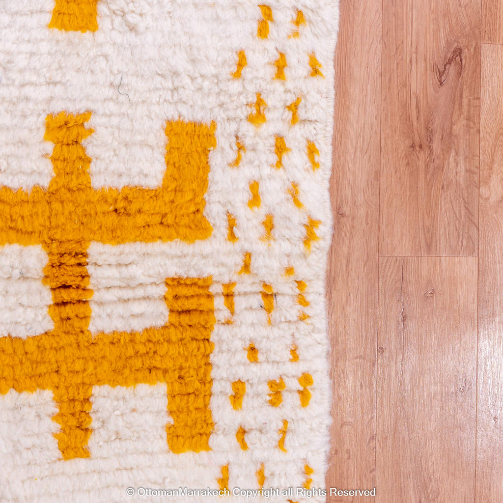 White Berber Rug with Geometric Saffron-Hued Patterns