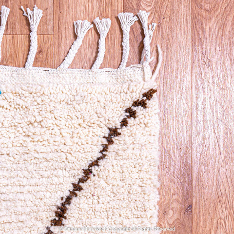 White Berber Rug with Soft Geometric Symbols and Pink Accents