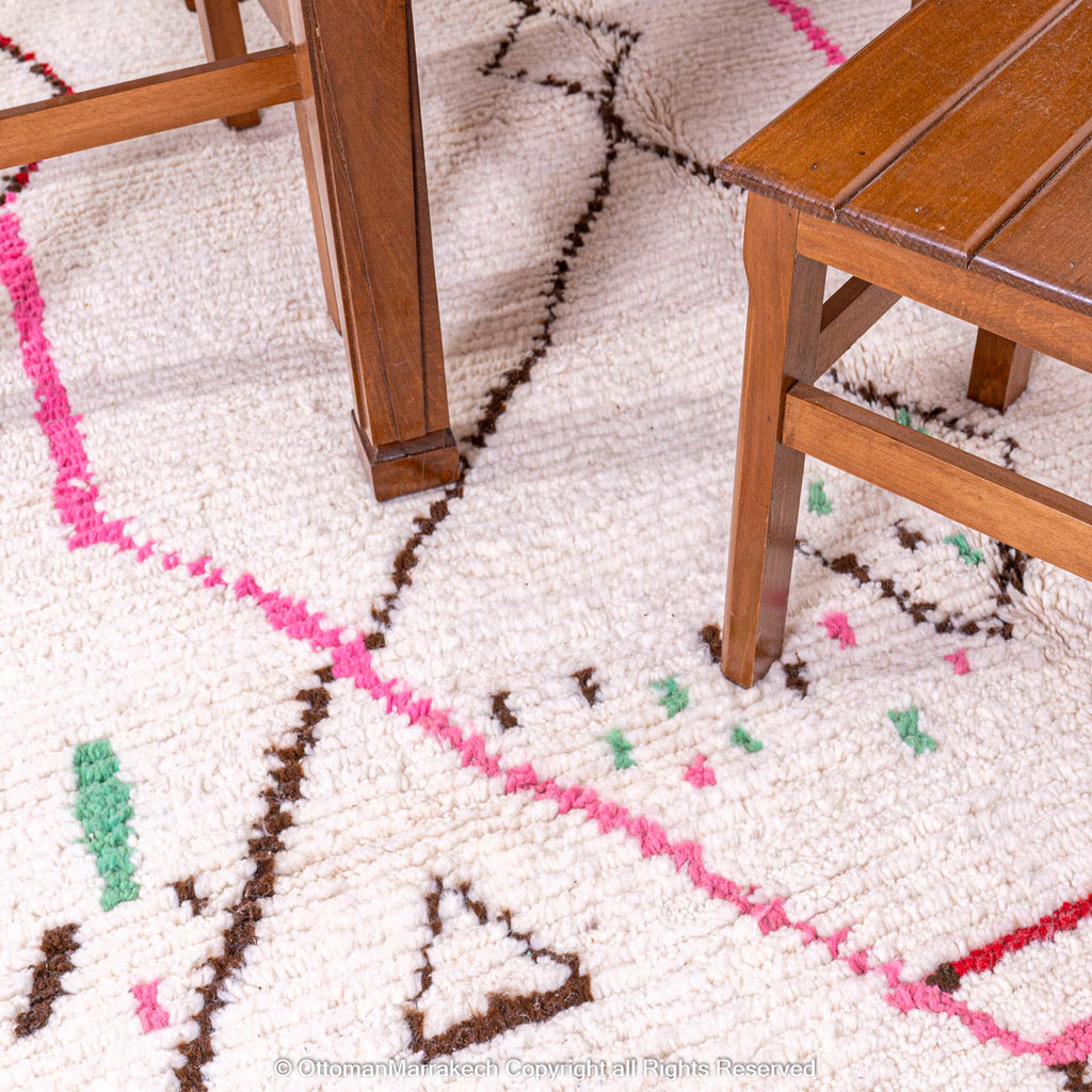 White Berber Rug with Soft Geometric Symbols and Pink Accents