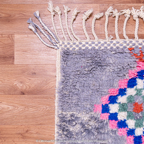 Gradient Blue Berber Rug with Colorful Geometric Symbols and Natural Sheep Wool Accents