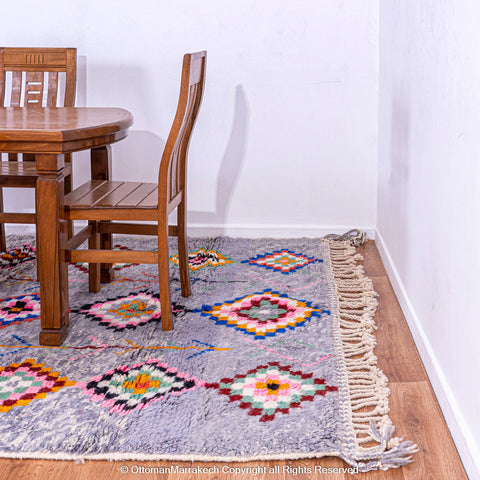 Gradient Blue Berber Rug with Colorful Geometric Symbols and Natural Sheep Wool Accents