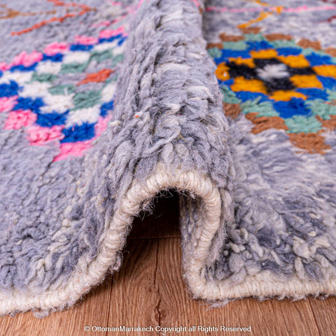 Gradient Blue Berber Rug with Colorful Geometric Symbols and Natural Sheep Wool Accents