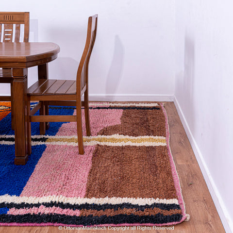 Vibrant Moroccan Geometric Rug with Bold Black Lines and Orange-Pink Stripes