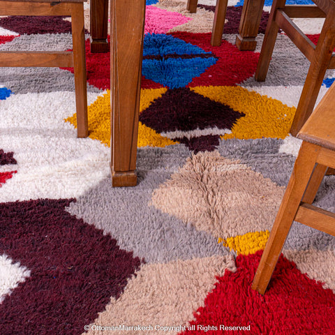 Antique-Inspired Geometric Multi-Color Moroccan Wool Rug - Red, Blue, and Pink Accents