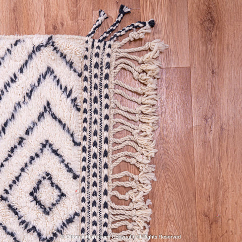 White Berber Rug with Bold Black Diamond Pattern