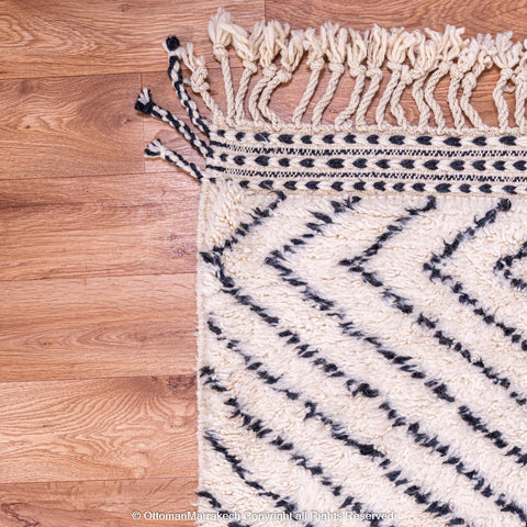 White Berber Rug with Bold Black Diamond Pattern