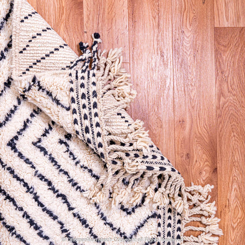 White Berber Rug with Bold Black Diamond Pattern