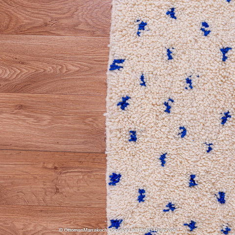 White Natural Wool Rug with Blue Dots and Embroidered Margins