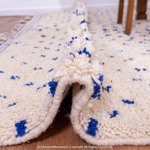 White Natural Wool Rug with Blue Dots and Embroidered Margins