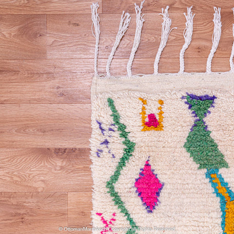 White Berber Rug with Vibrant Geometric Symbols