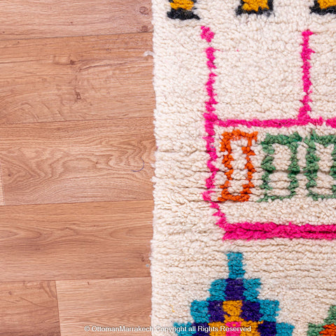 White Berber Rug with Vibrant Geometric Symbols