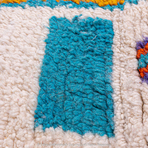 White Berber Rug with Vibrant Geometric Symbols