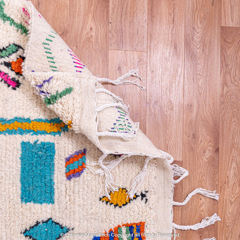 White Berber Rug with Vibrant Geometric Symbols