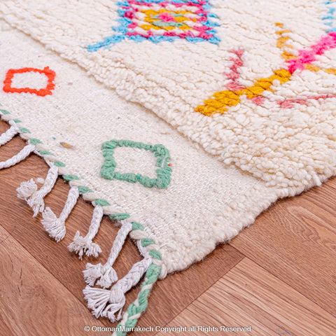 White Moroccan Berber Rug with Vibrant Diamond Motifs