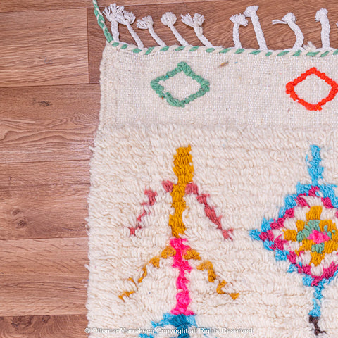 White Moroccan Berber Rug with Vibrant Diamond Motifs