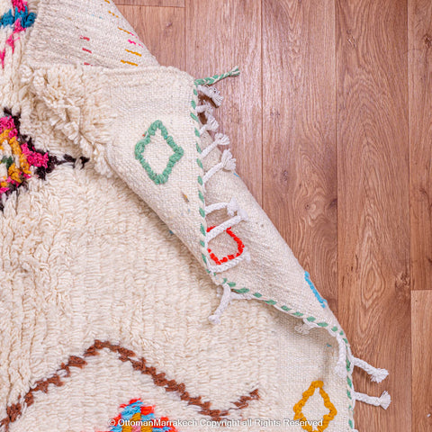 White Moroccan Berber Rug with Vibrant Diamond Motifs