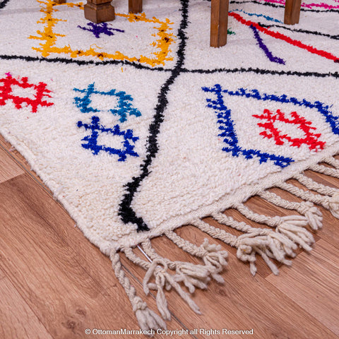 White Beni Ourain Rug with Black Diamond Lines and Colorful Berber Symbols