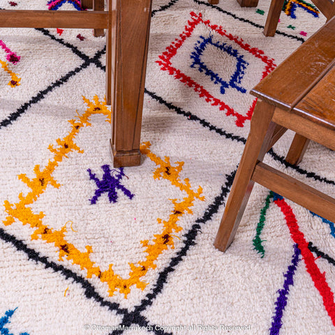 White Beni Ourain Rug with Black Diamond Lines and Colorful Berber Symbols