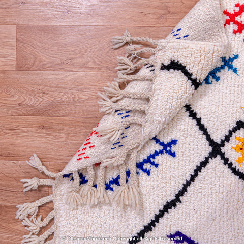 White Beni Ourain Rug with Black Diamond Lines and Colorful Berber Symbols