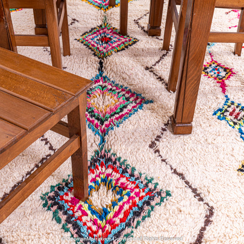 Handwoven Moroccan Rug with Colorful Diamond Pattern and Side Floral Embroidery