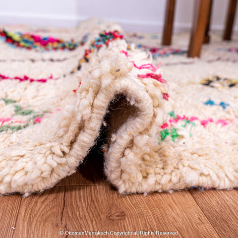 Handwoven Moroccan Rug with Colorful Diamond Pattern and Side Floral Embroidery