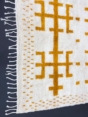 White Berber Rug with Geometric Saffron-Hued Patterns